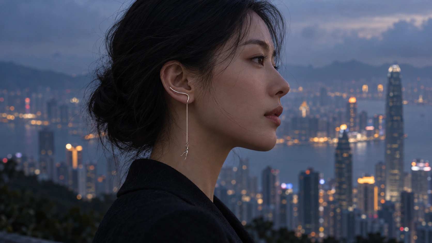 Peak earring against the Hong Kong skyline